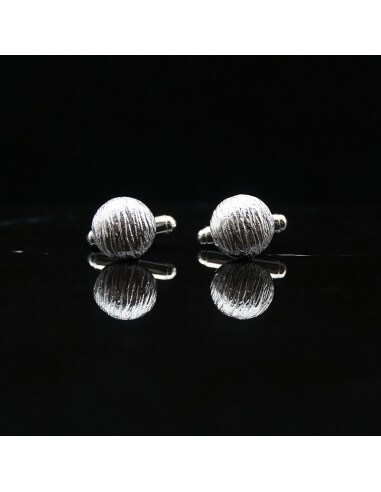 Boutons de manchettes en argent...